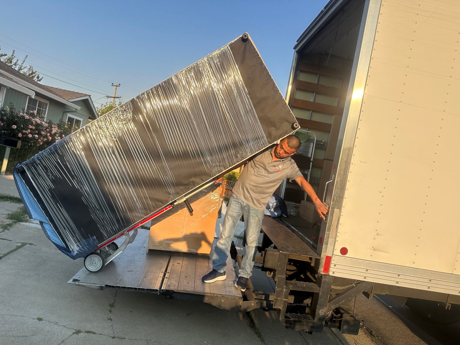 Speedy Moving team loading household furniture into truck for local Bay Area move