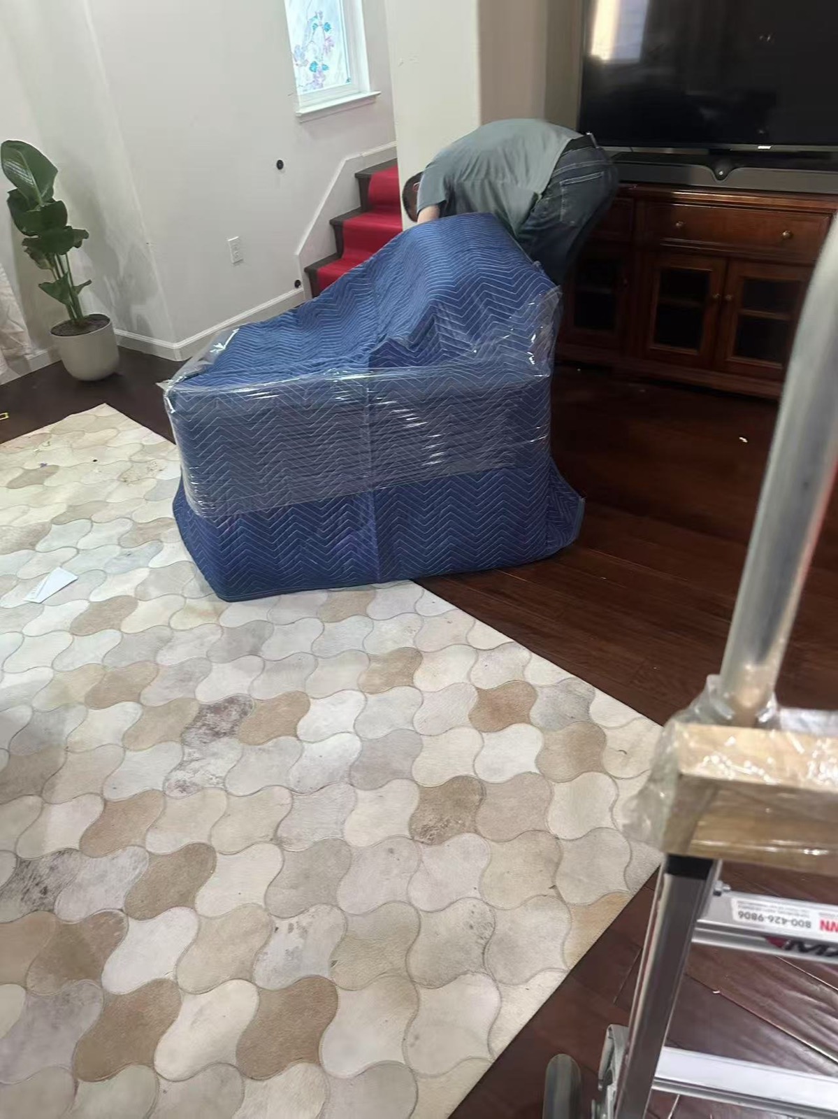 Furniture Assembly Speedy Moving Service LLC Moving team assembling and setting up furniture at customer's new home